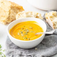 Easy Roasted Butternut Squash Soup with spoon and bread