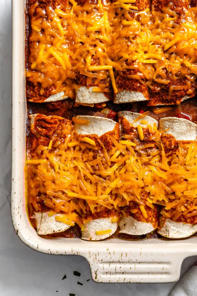 Easy Vegetarian Enchiladas Recipe enchiladas in a pan 