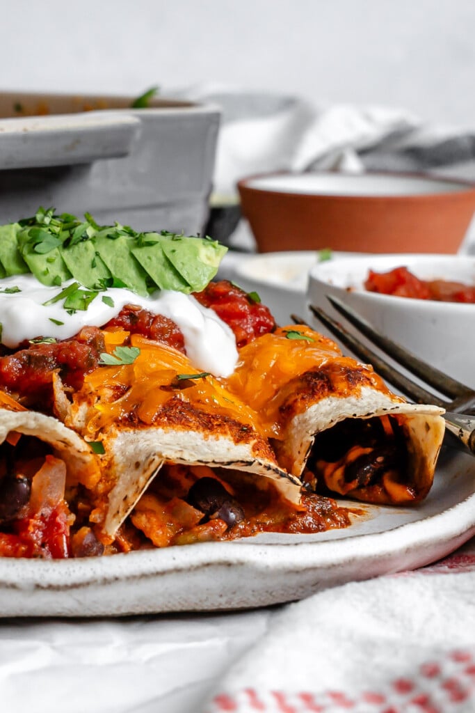 Easy Vegetarian Enchiladas Recipe with avocado and sour cream 