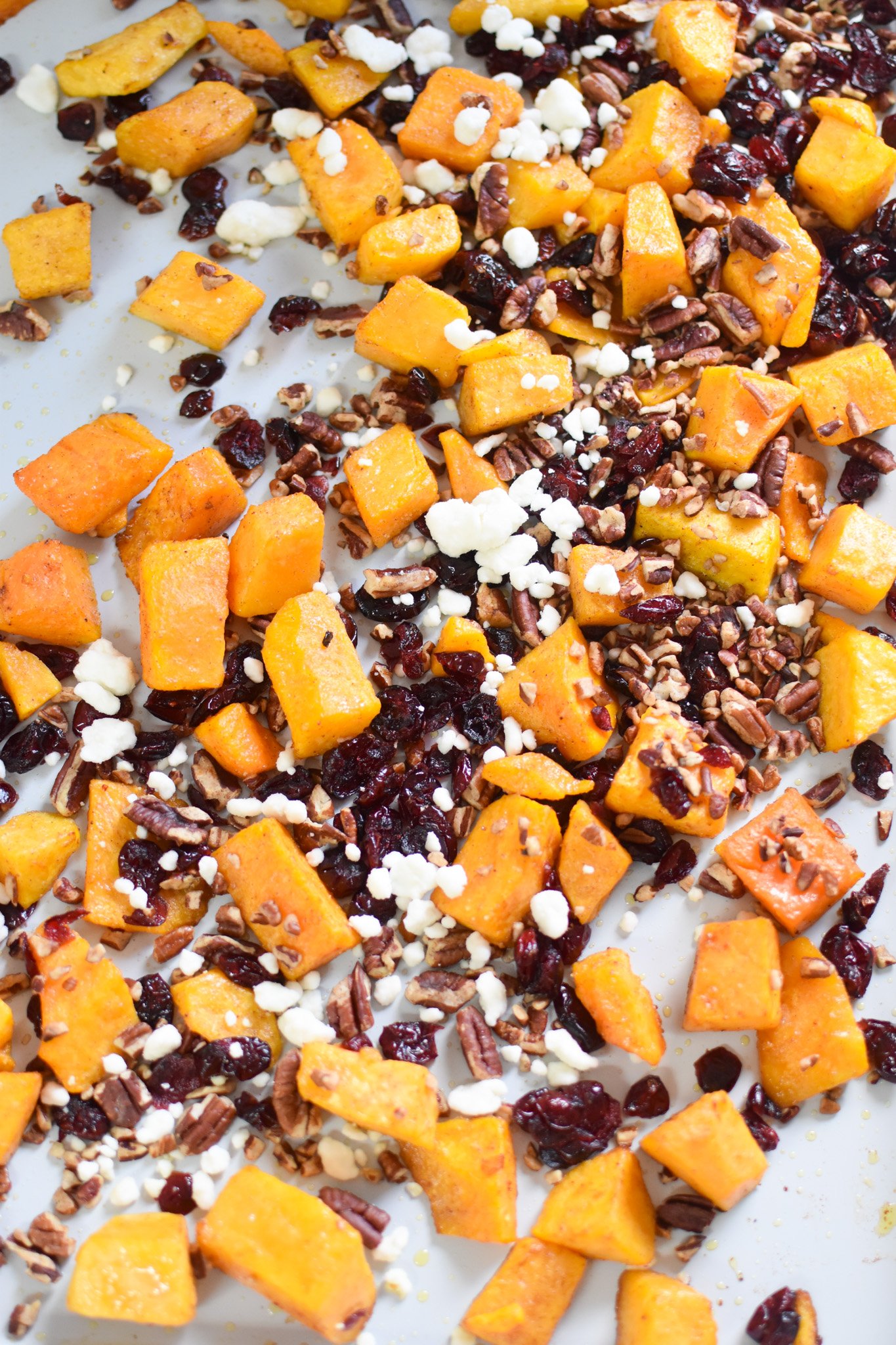 Roasted Butternut Squash with Cranberries on baking tray