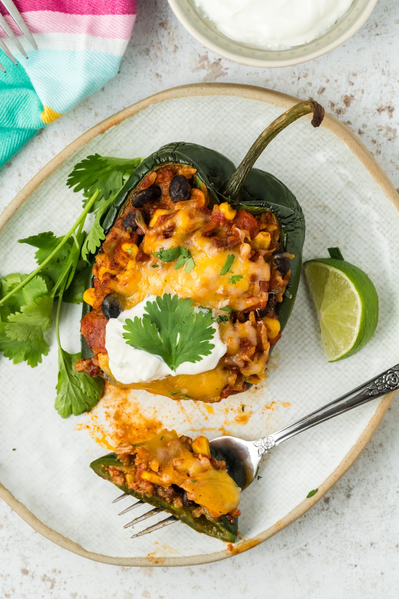 Stuffed Poblano Peppers Recipe with fork on plate