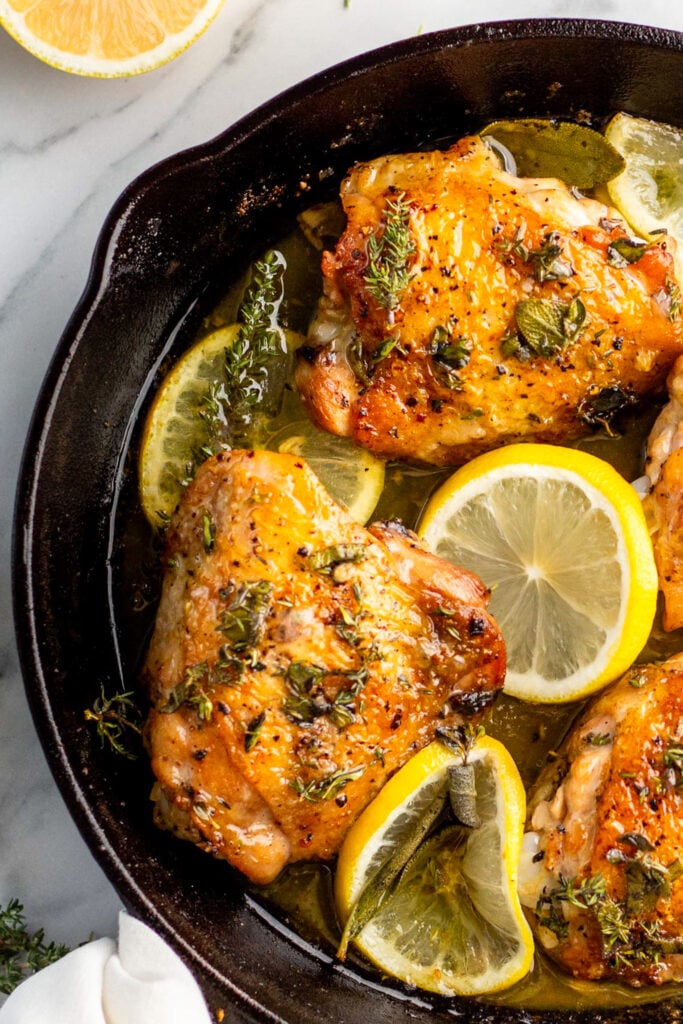Lemon Garlic Chicken in cast iron skillet.