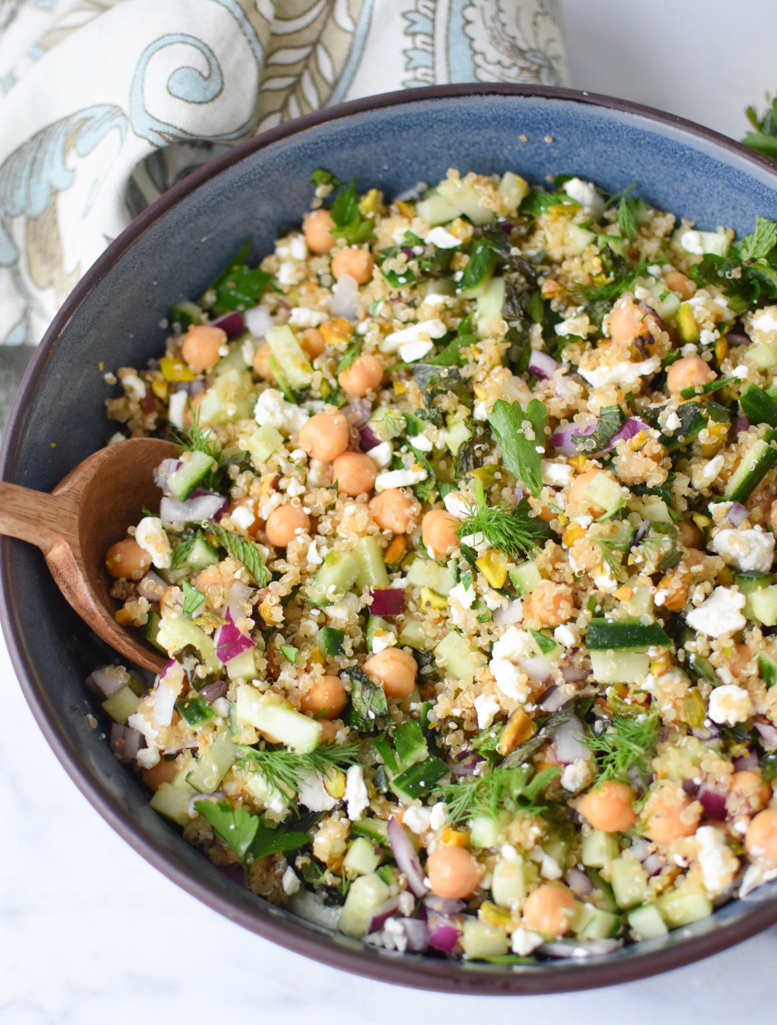 salad ingredients combined in a salad bowl. 