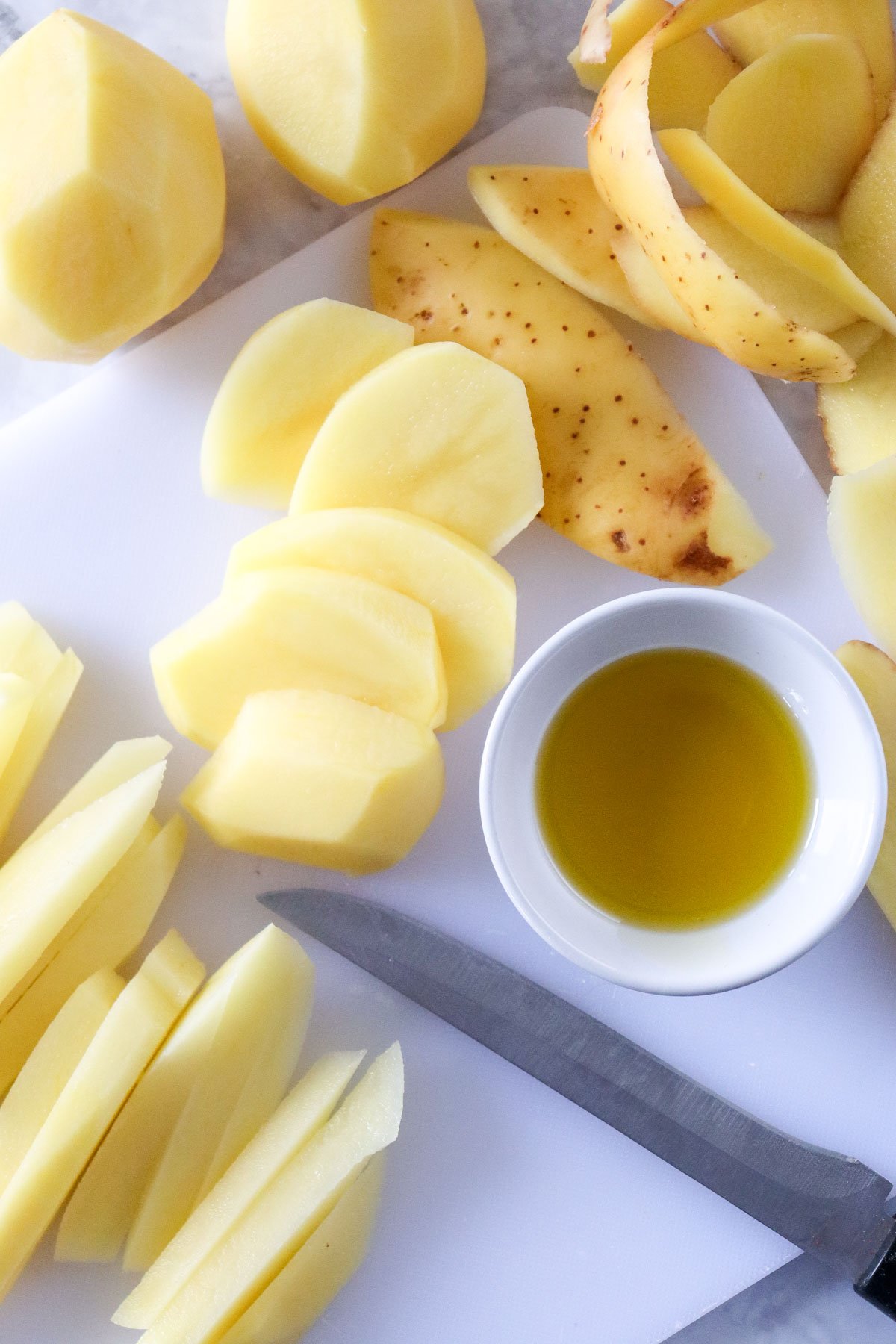 Air Fryer French Fries Recipe fries being cut 