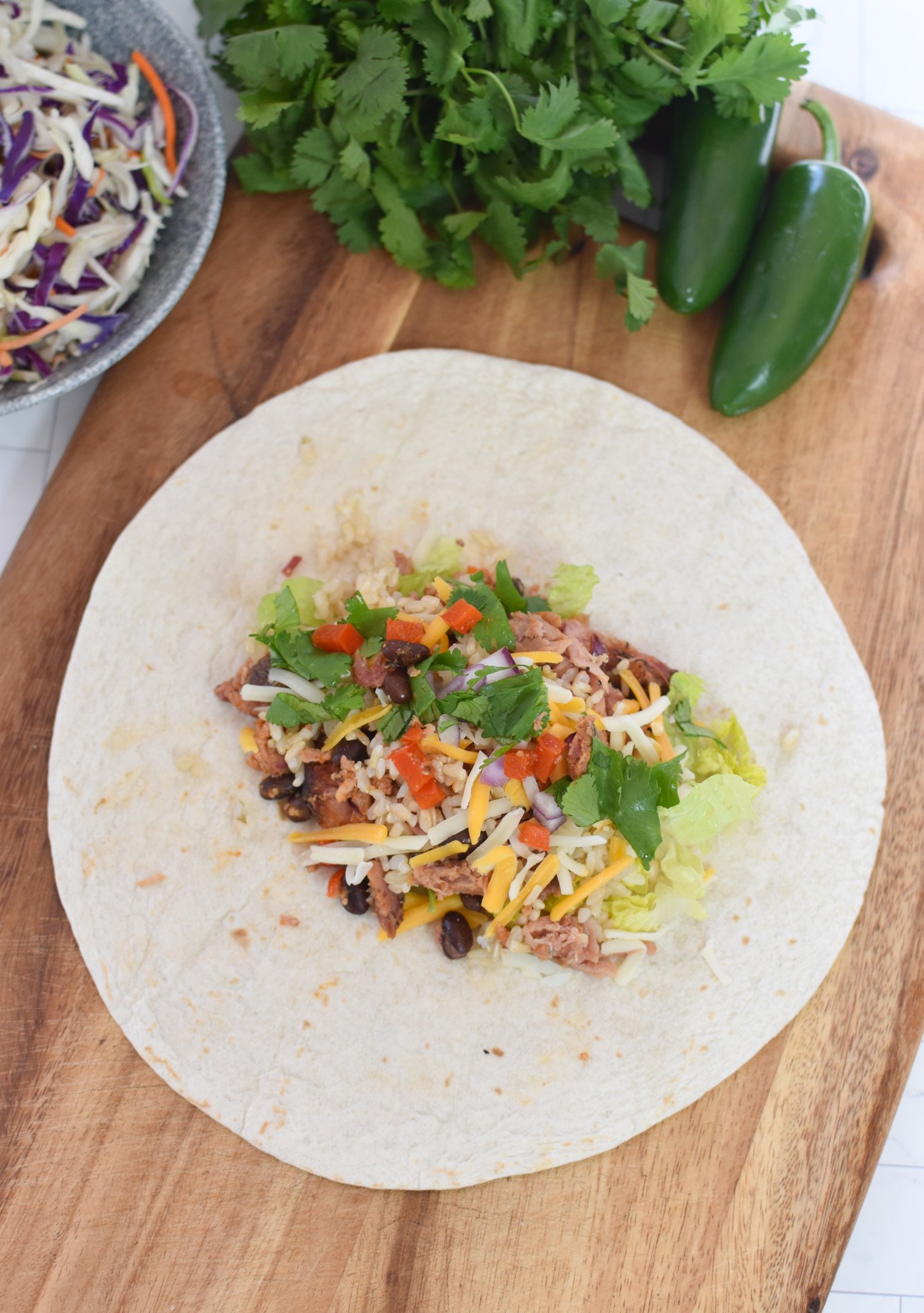 Pulled Pork Burritos filling on a tortilla