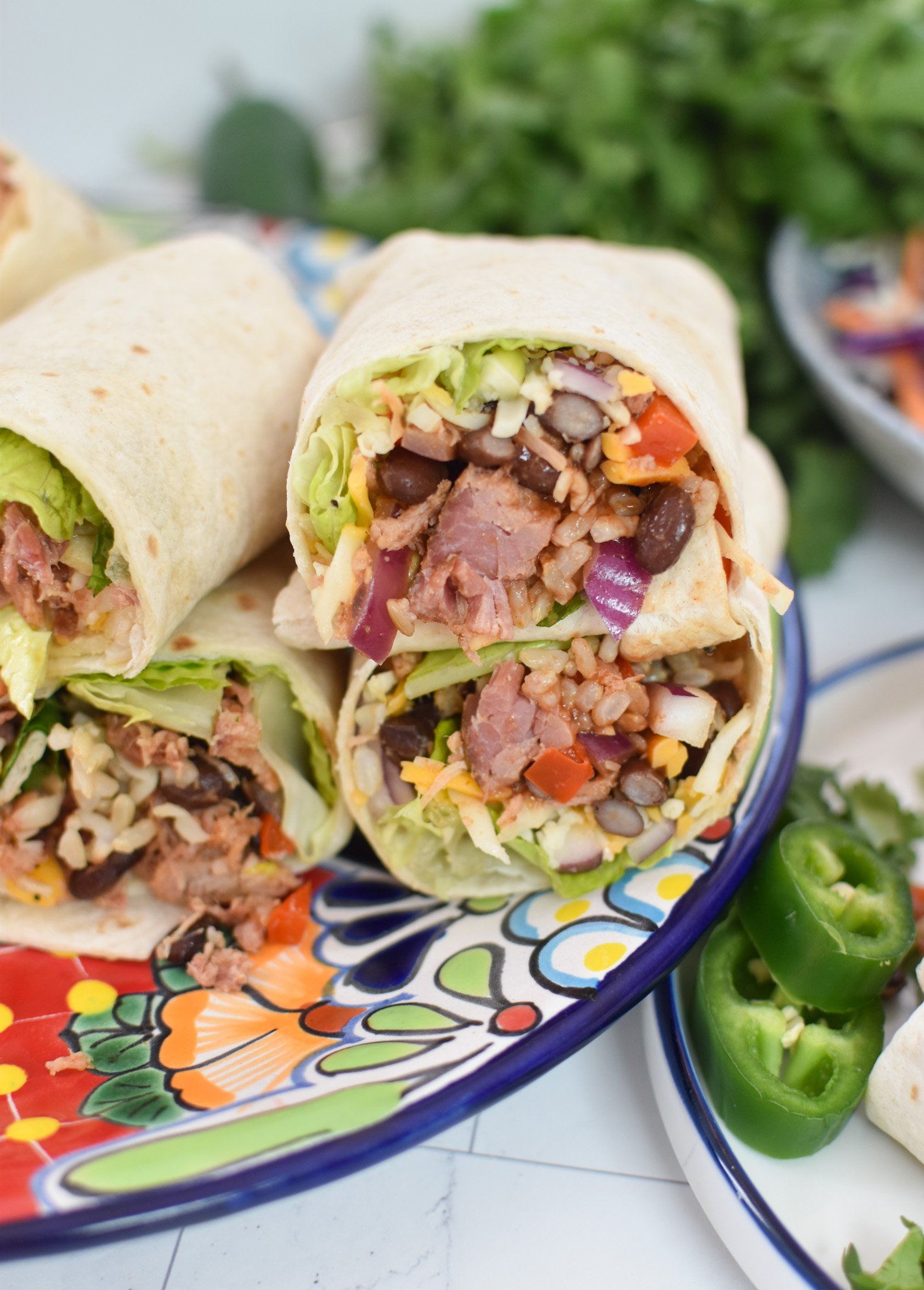 Pulled Pork Burritos on a blue plate 