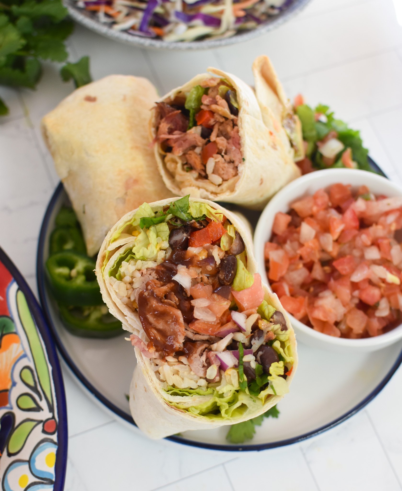 Pulled Pork Burritos on a white plate