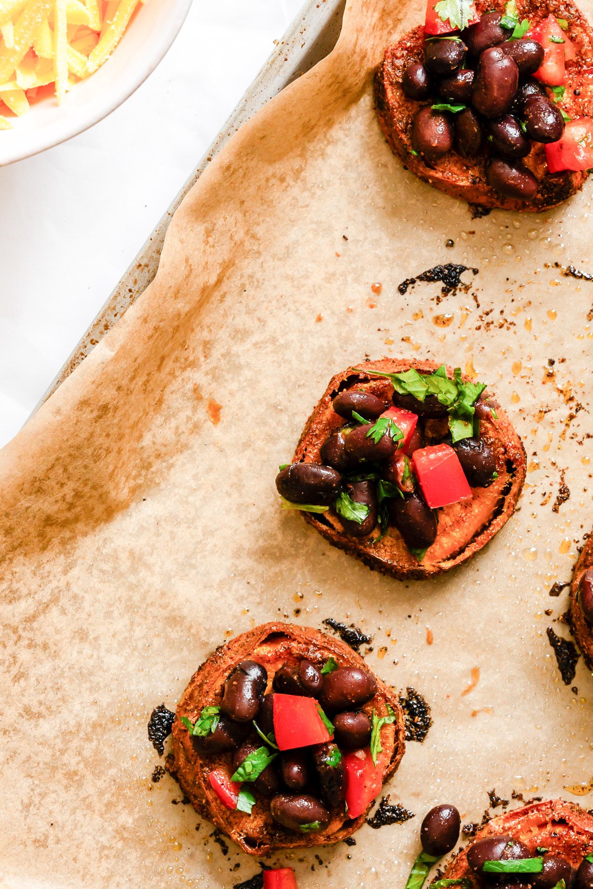 Southwestern Roasted Sweet Potato Rounds black beans on the sweet potato 