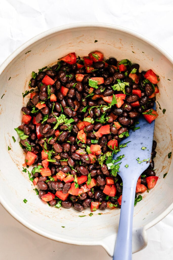 Southwestern Roasted Sweet Potato Rounds black bean mixture in a bowl