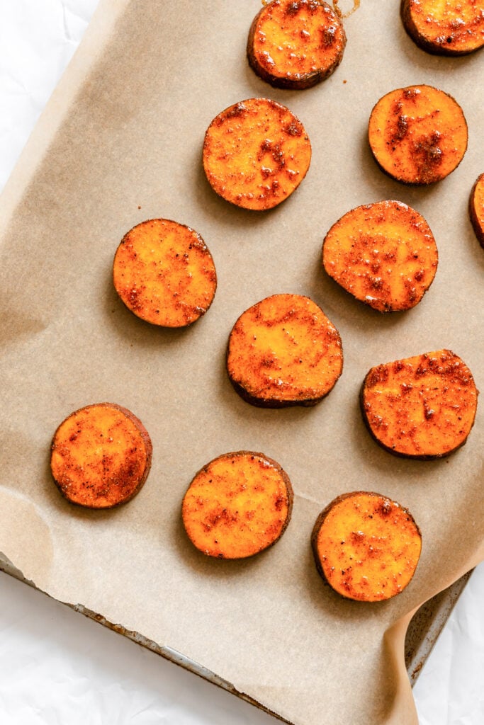 Southwestern Roasted Sweet Potato Rounds on a baking sheet