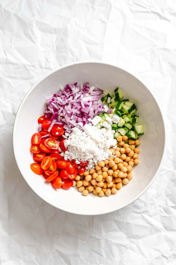Summer Orzo Pasta Salad ingredients in a bowl 