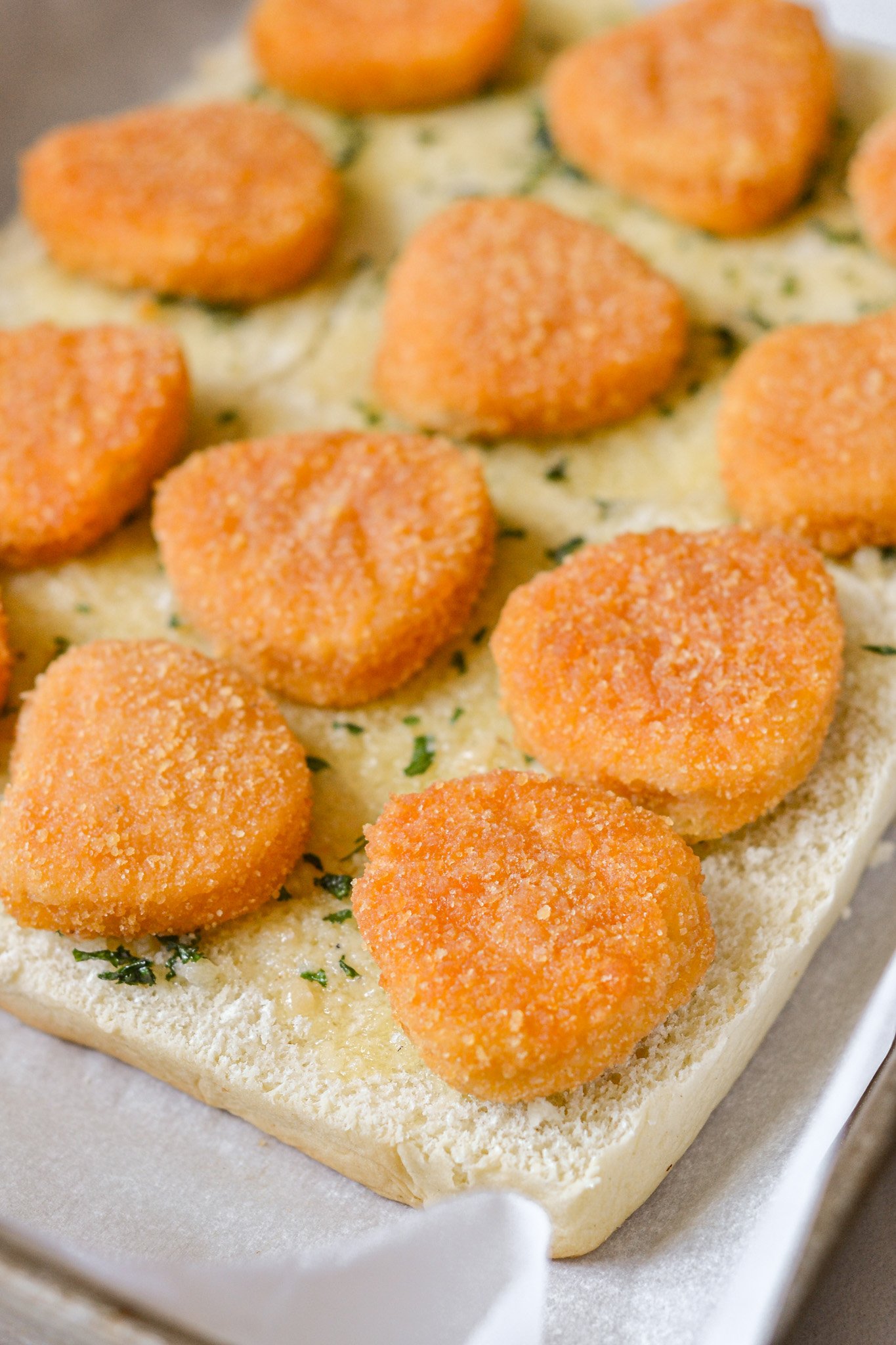 Easy Chicken Parmesan Sliders adding chicken to sliders 