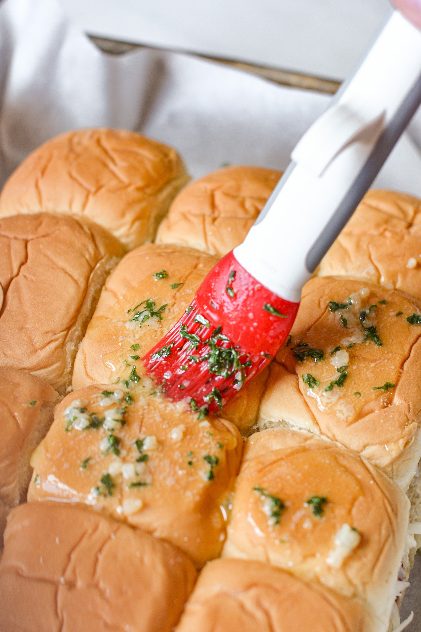 Easy Chicken Parmesan Sliders garlic butter on rolls 