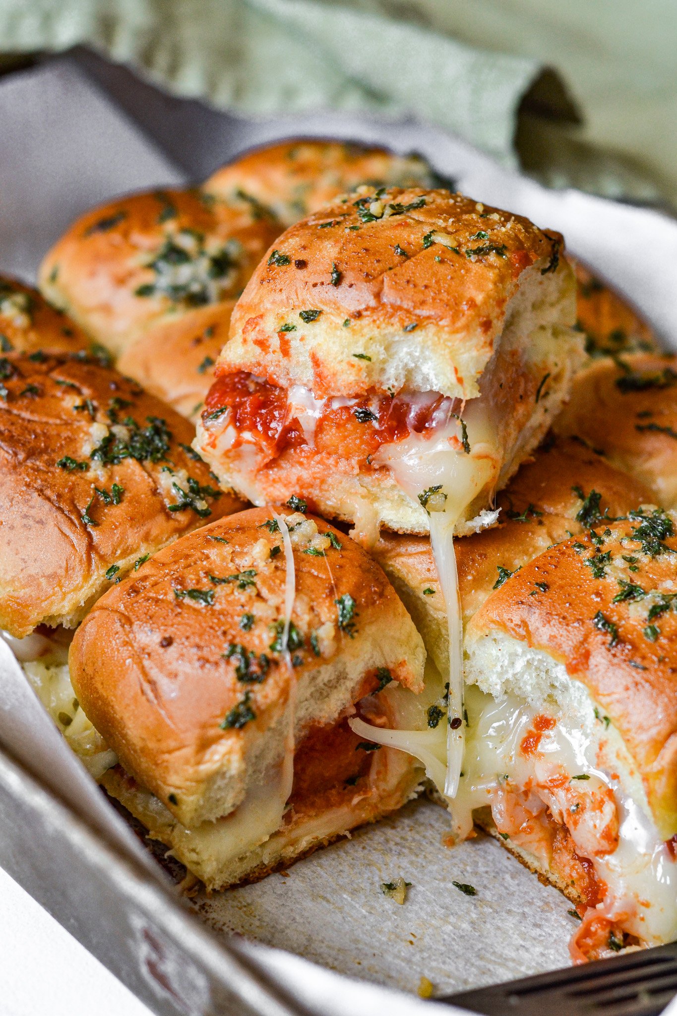 Easy Chicken Parmesan Sliders on a baking sheet 