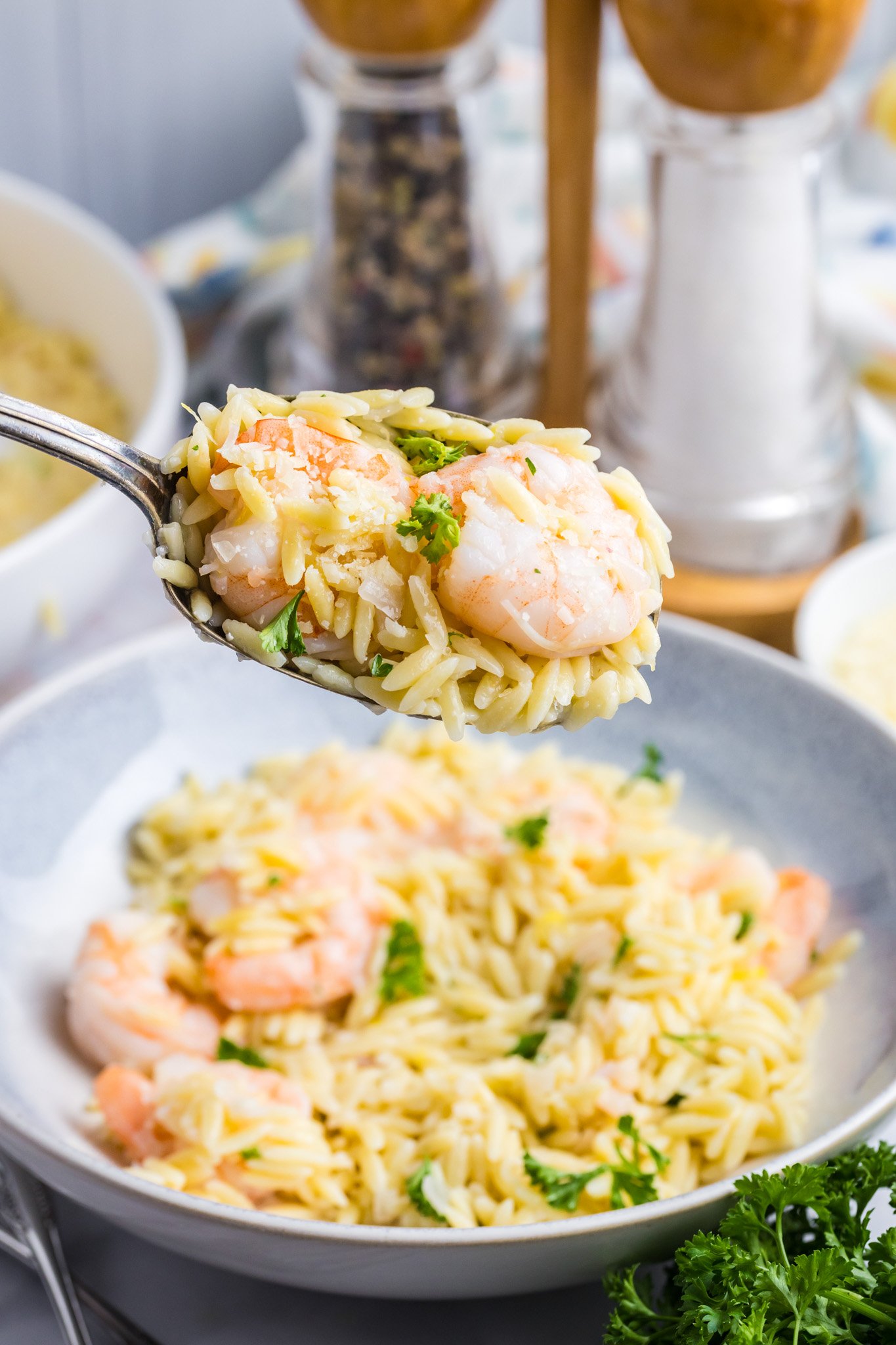 Lemon Shrimp and Orzo with shrimp on a spoon 