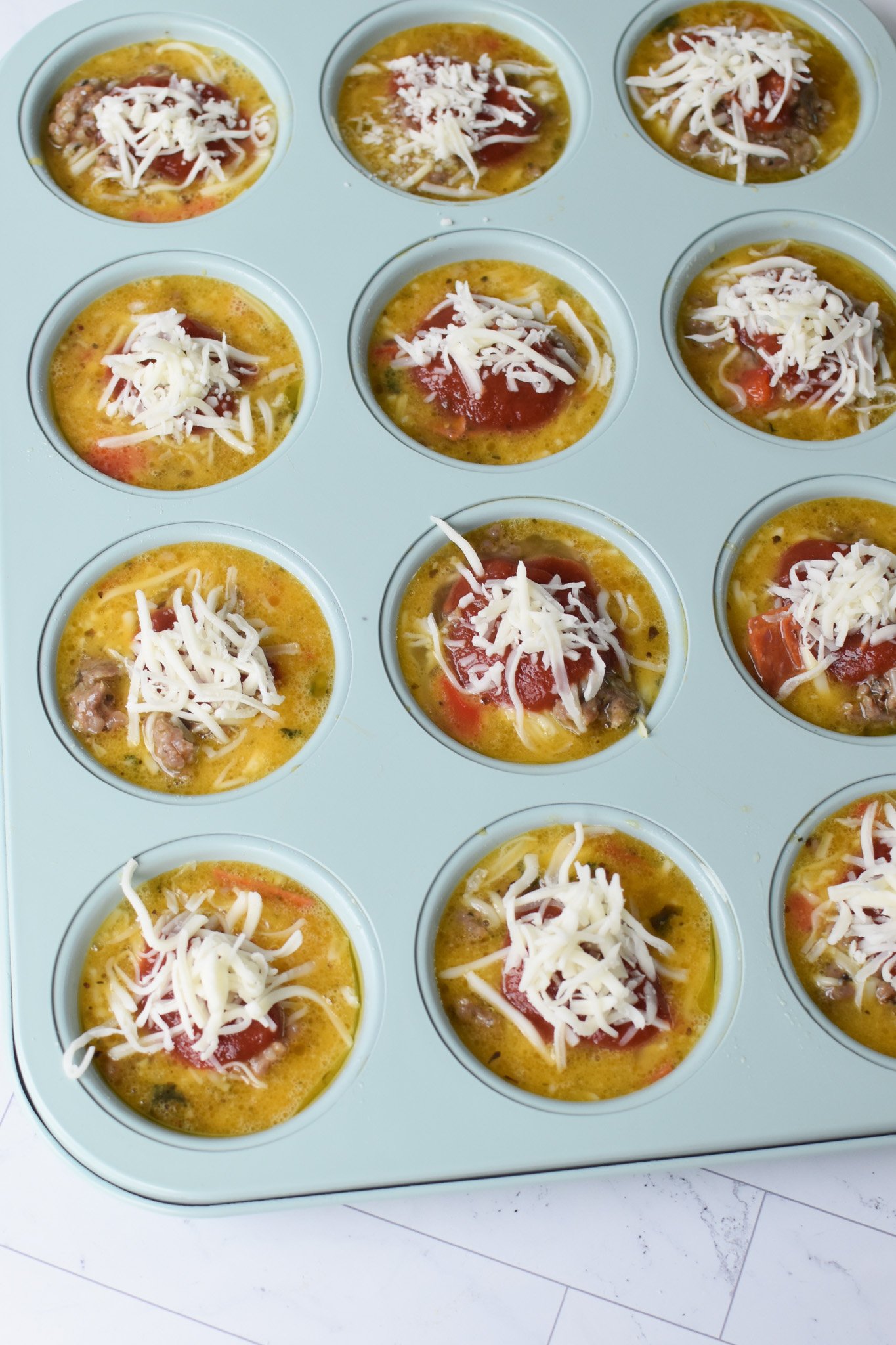 Pizza Egg Muffins in muffin tins 