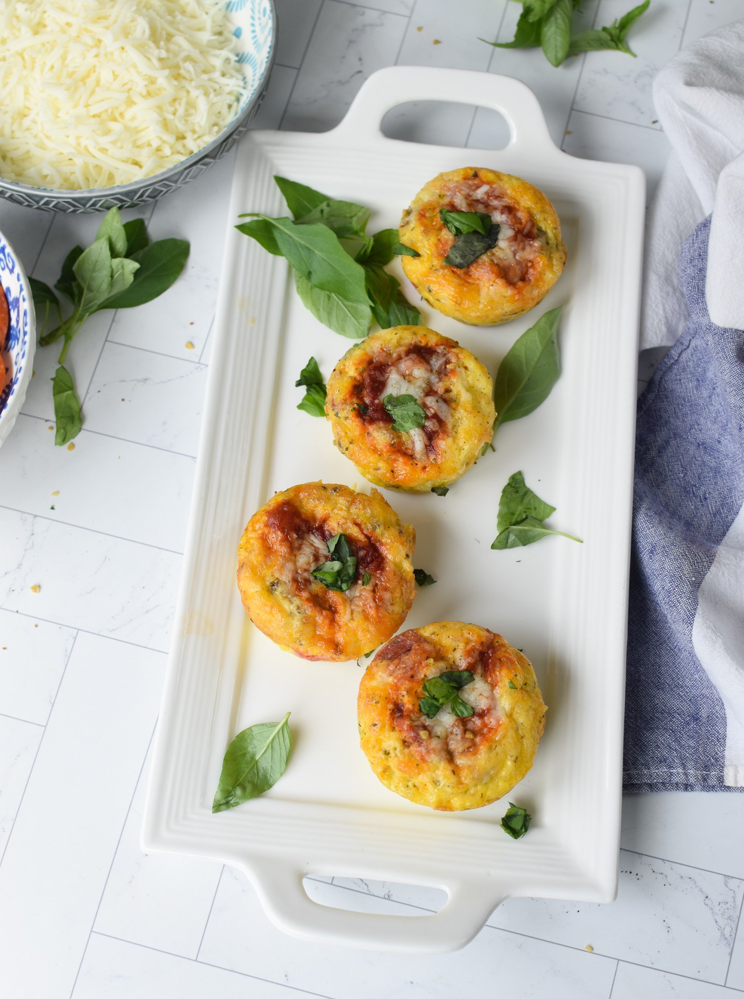 Pizza Egg Muffins on a white plate 