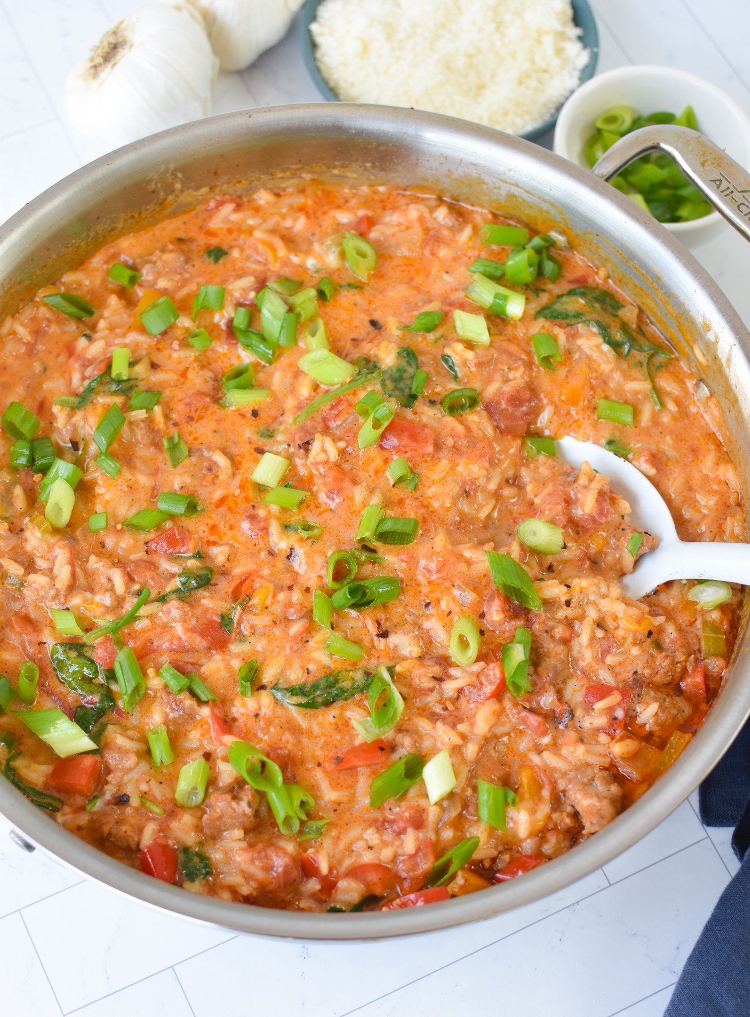 Creamy Cajun Sausage Rice Skillet with green onions