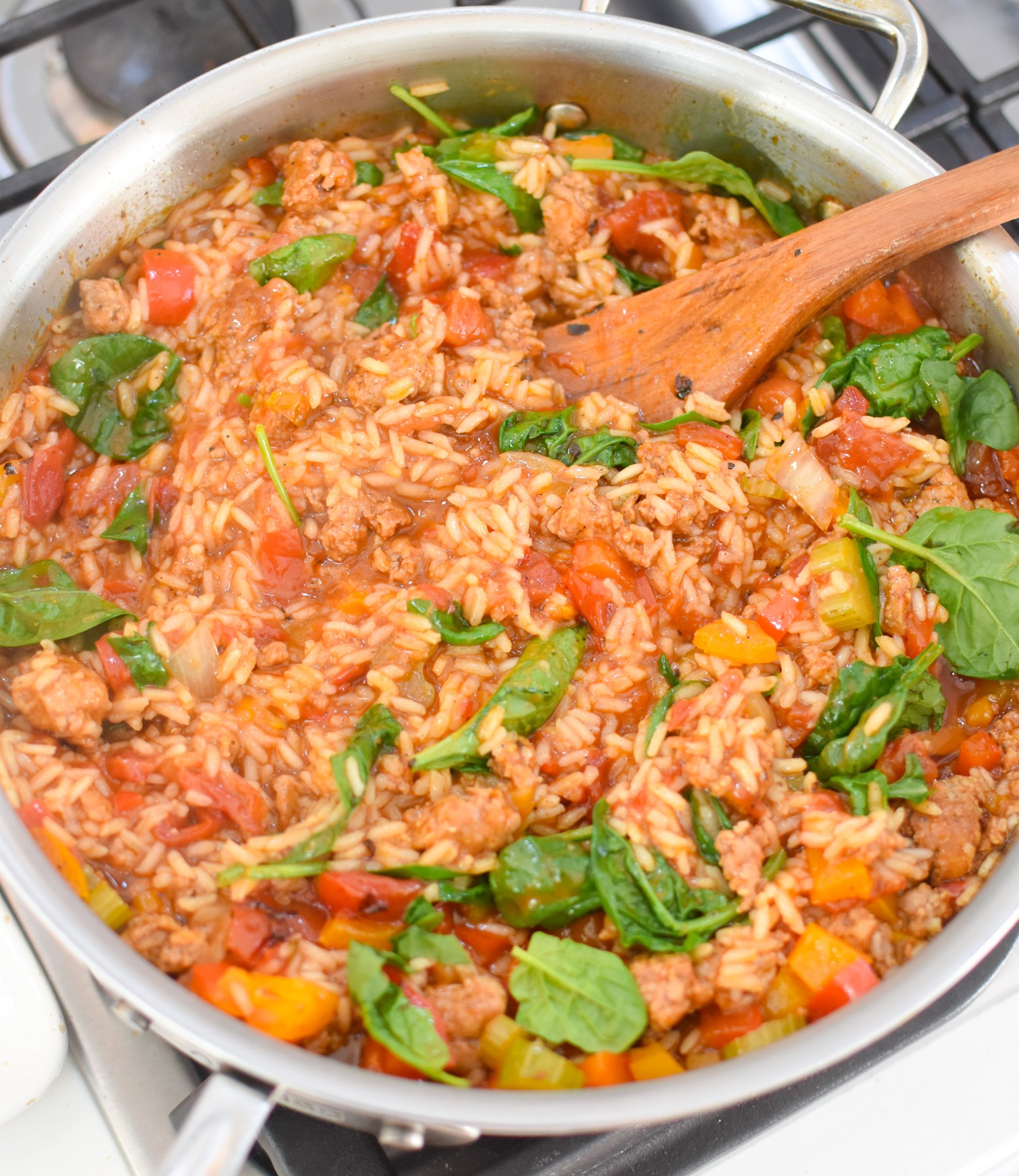 Creamy Cajun Sausage Rice Skillet with spinach 