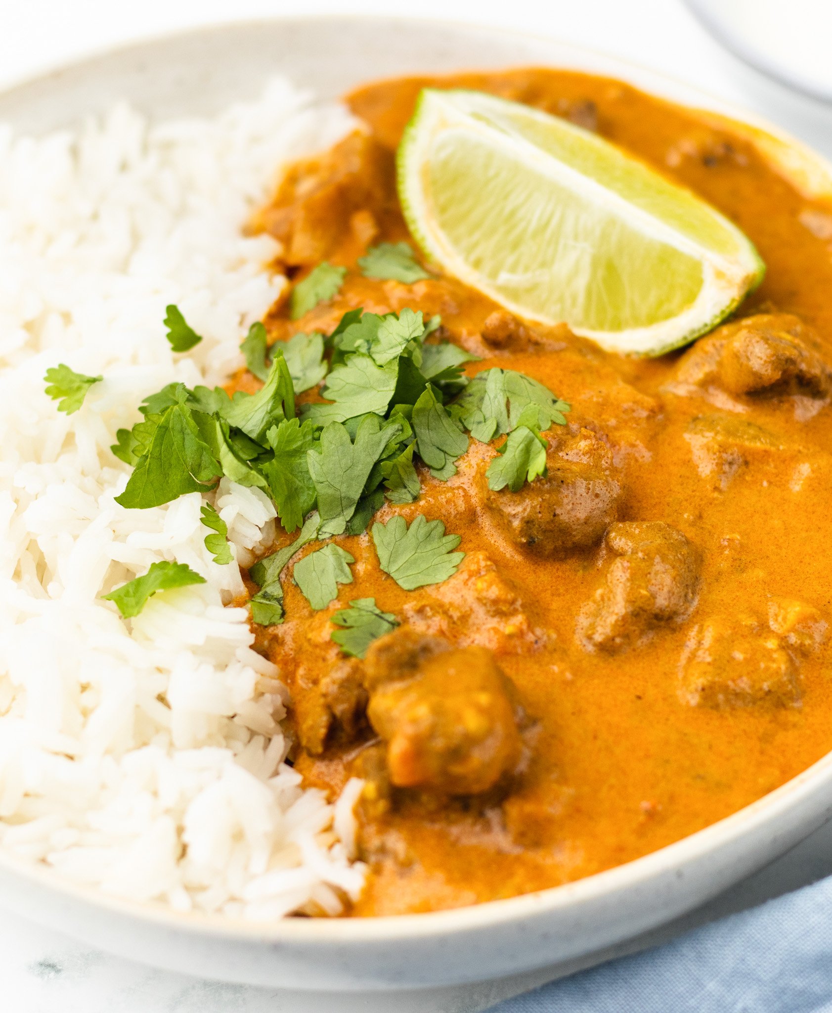 Easy Lamb Curry Recipe with lime wedge