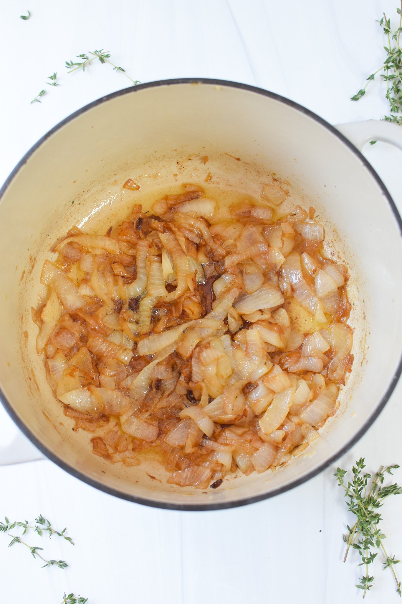 French Onion Pork Chops caramelized onions in a dutch oven 