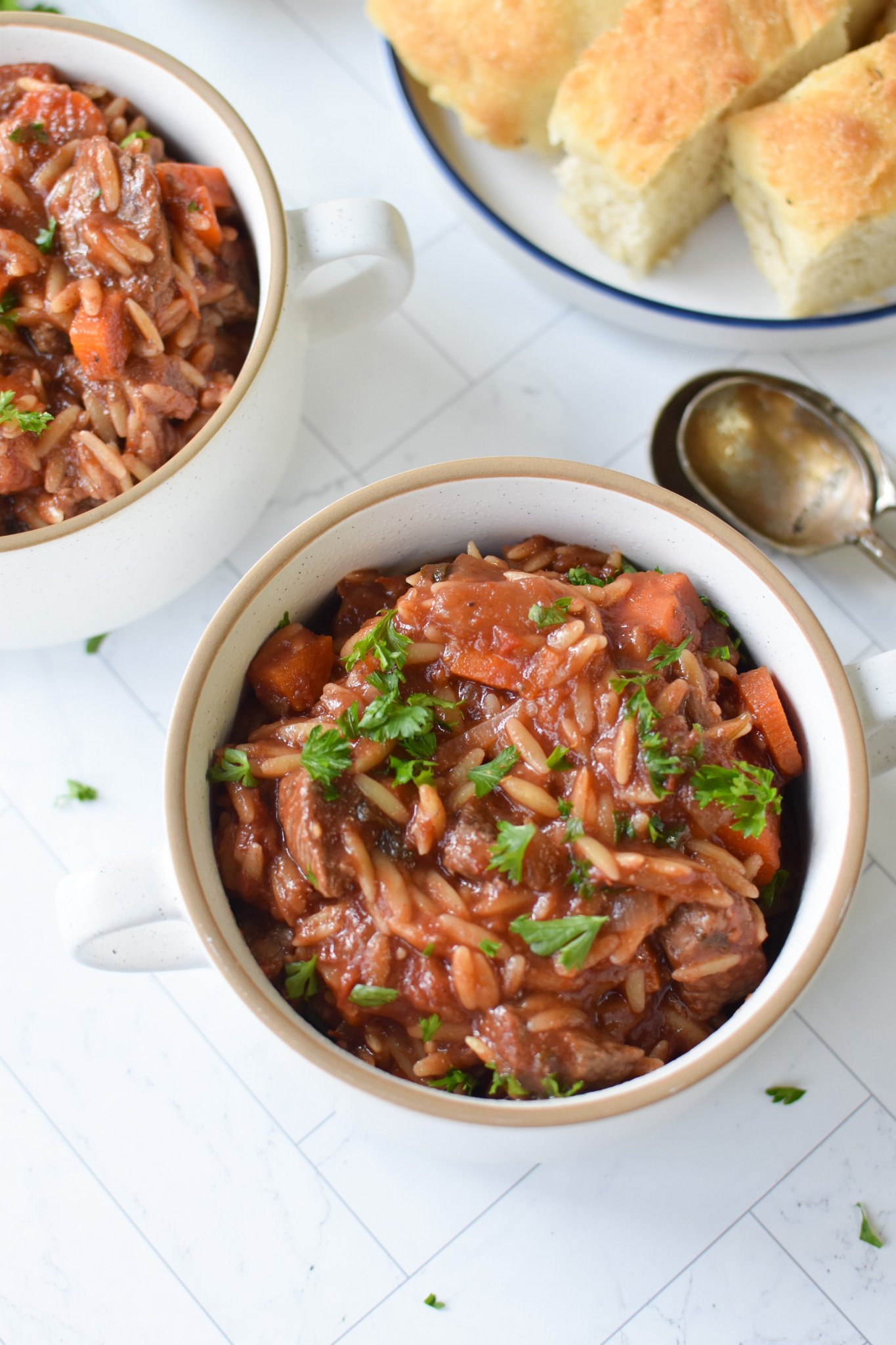 Greek Beef Stew with Orzo in small bowls 