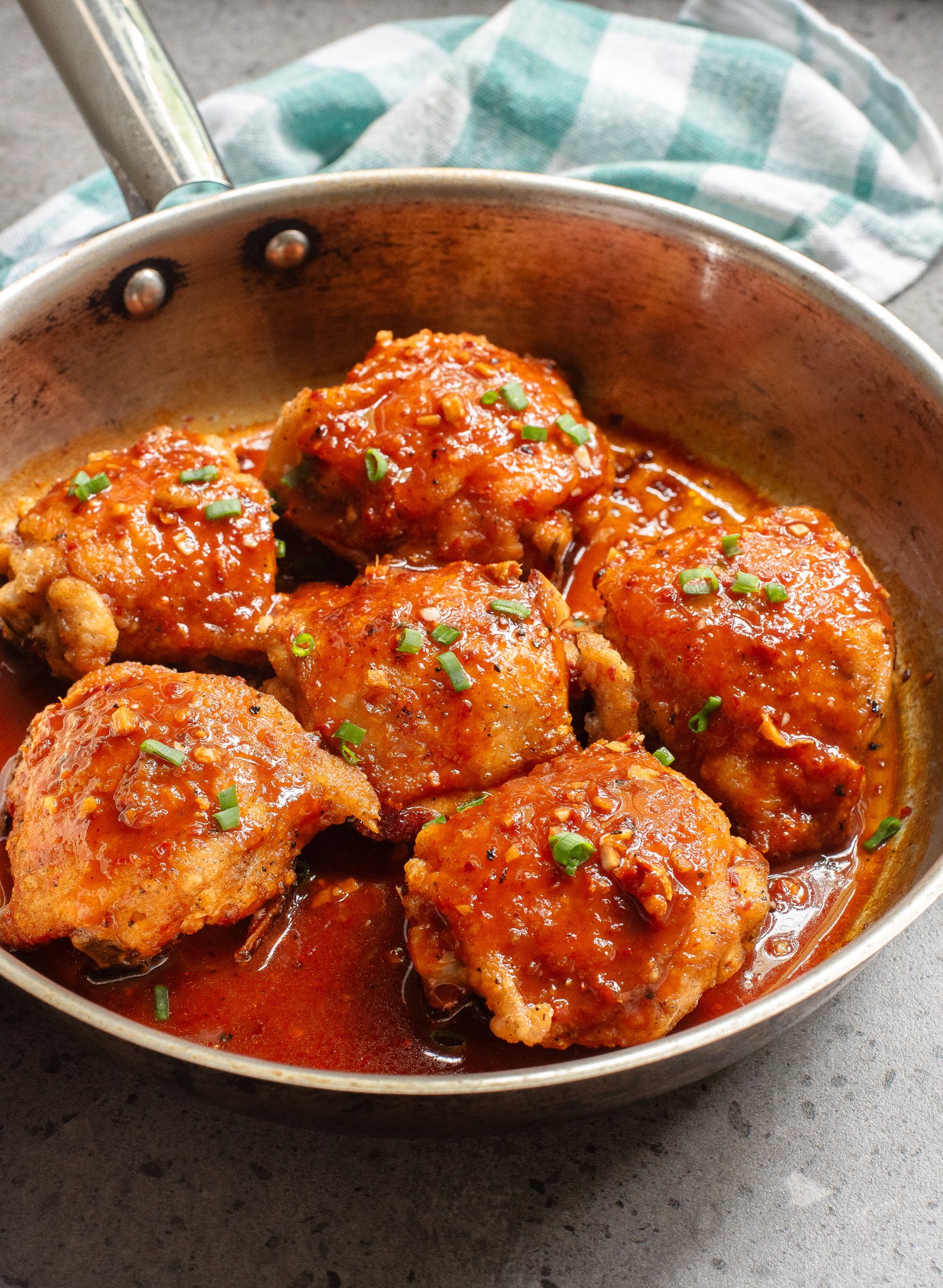 Honey Ginger Chicken in a skillet with sauce