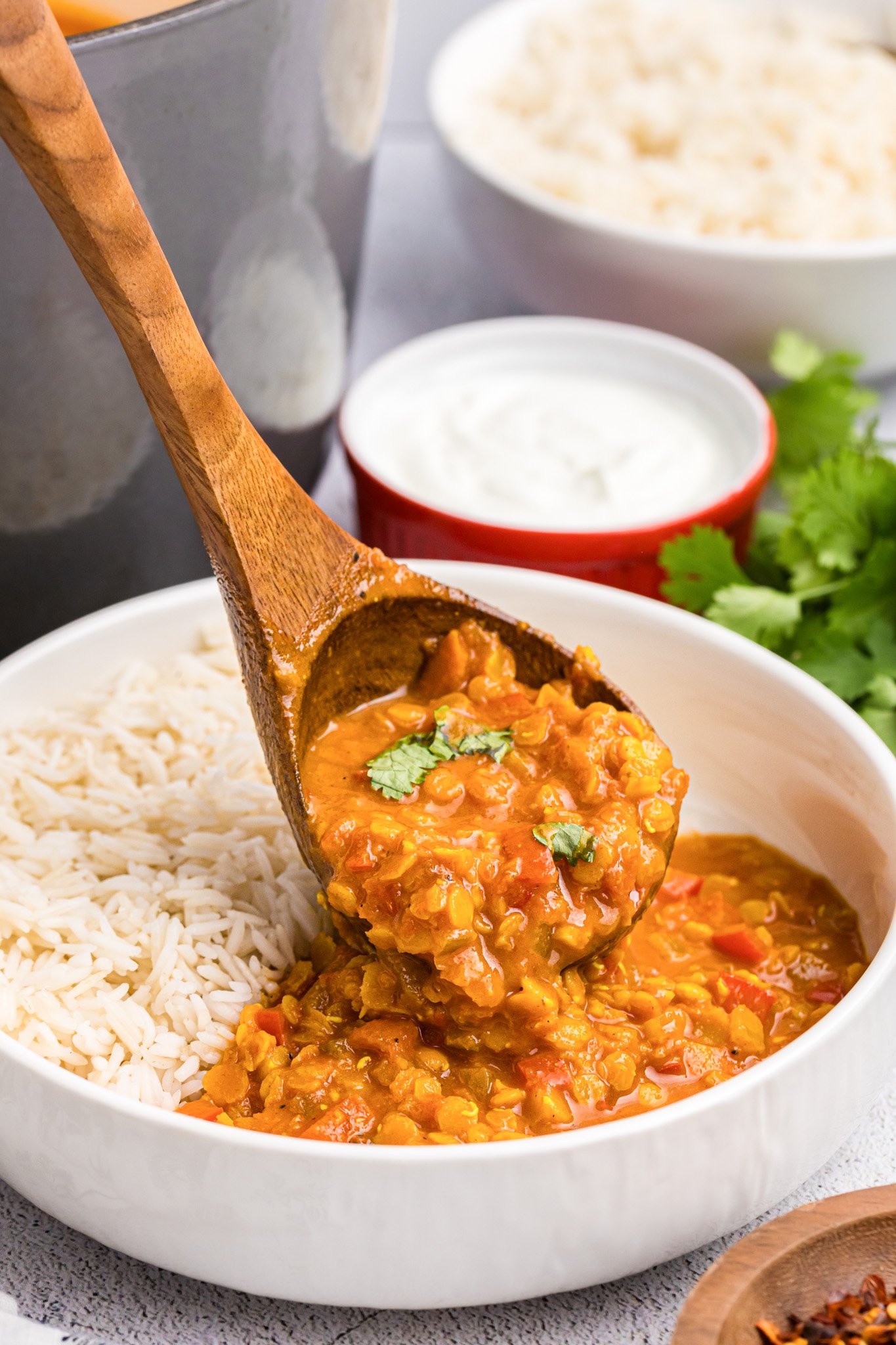 Easy Red Lentil Dahl Recipe with spoon 