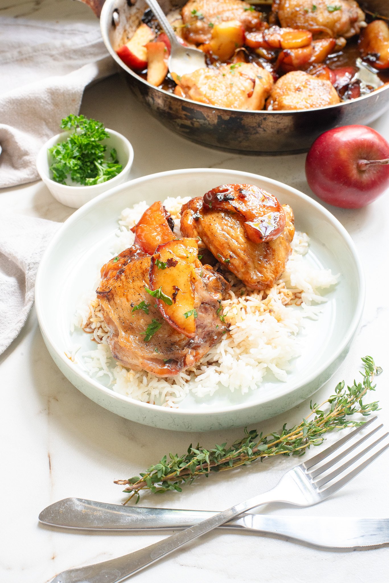 Skillet Apple Cider Chicken on white plate 