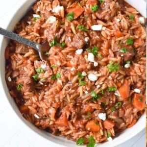 Greek Beef Stew with Orzo in white bowl