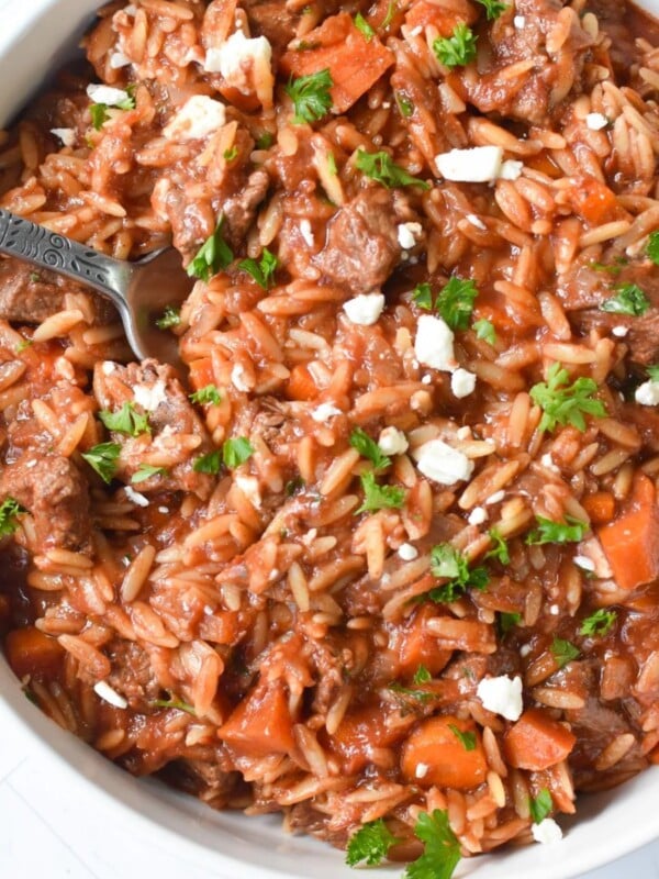Greek Beef Stew with Orzo in white bowl