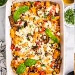 Mediterranean Roasted Vegetable Pasta in a white baking dish