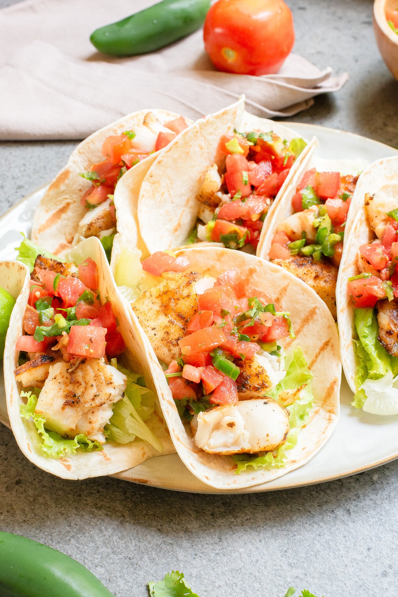 Blackened Fish Tacos on a plate with salsa