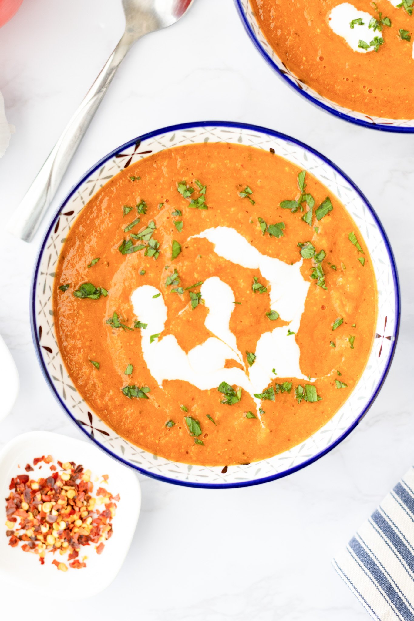 Lentil Tomato Soup with a swirl of greek yogurt 