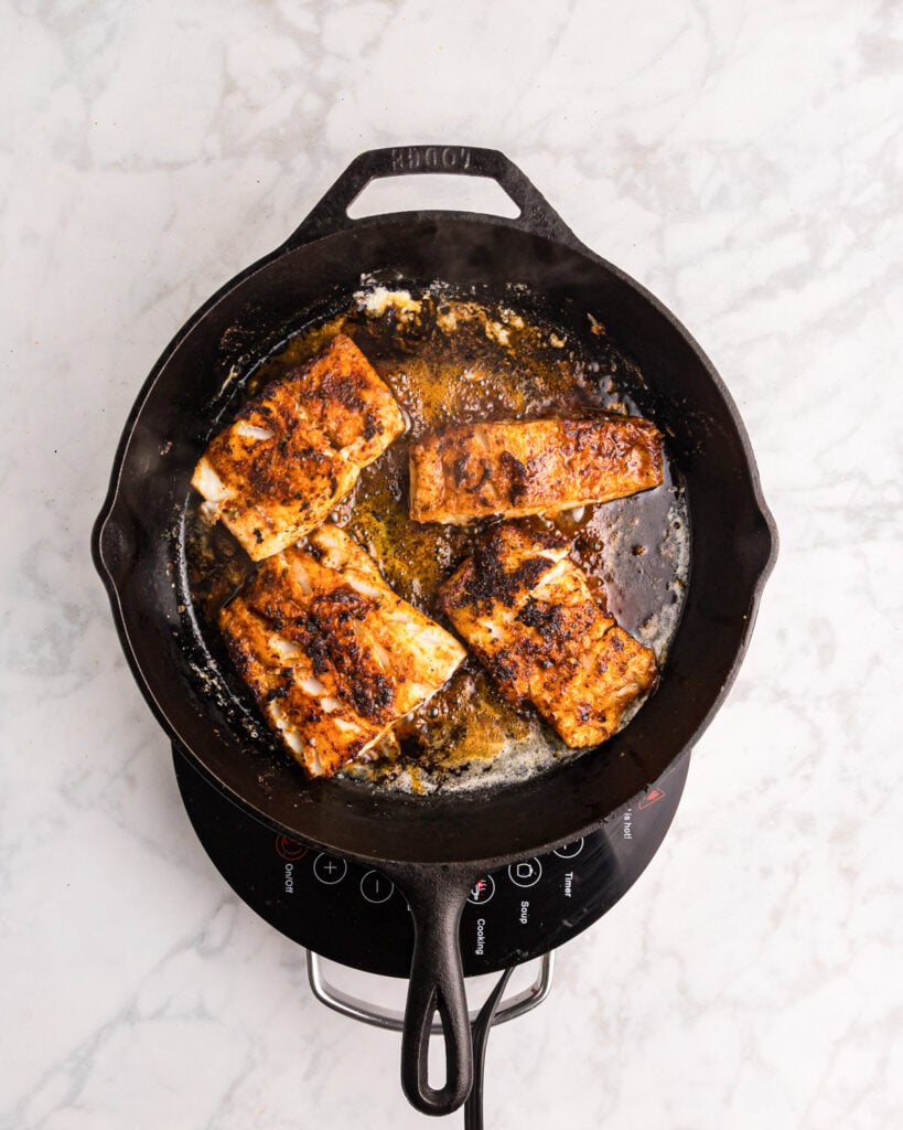 Easy Blackened Cod in a skillet 