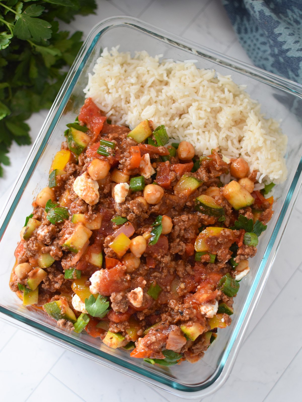 Mediterranean Ground Beef Skillet in a tupperware container 