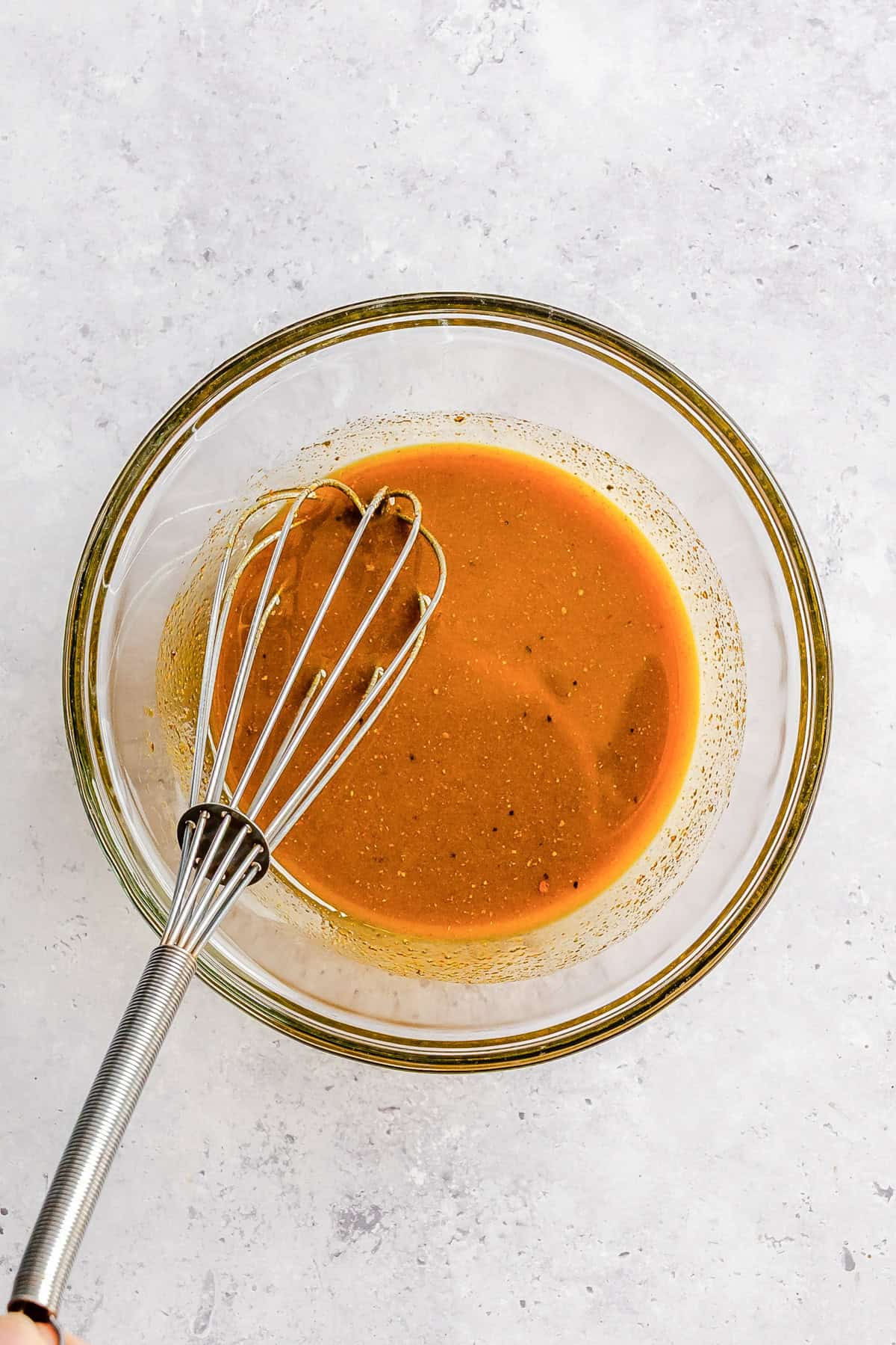 Turmeric spice and olive soil in bowl 