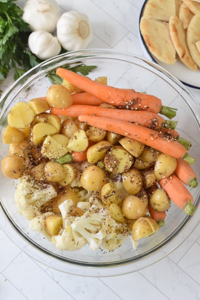 Sheet Pan Za’atar Chicken potatoes and veggies in bowl 