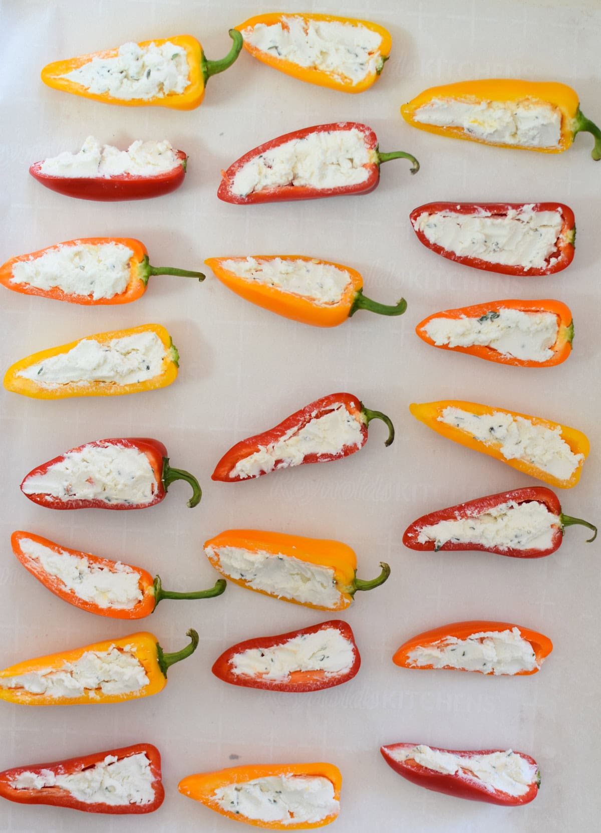 Goat Cheese Stuffed Mini Peppers on baking sheet