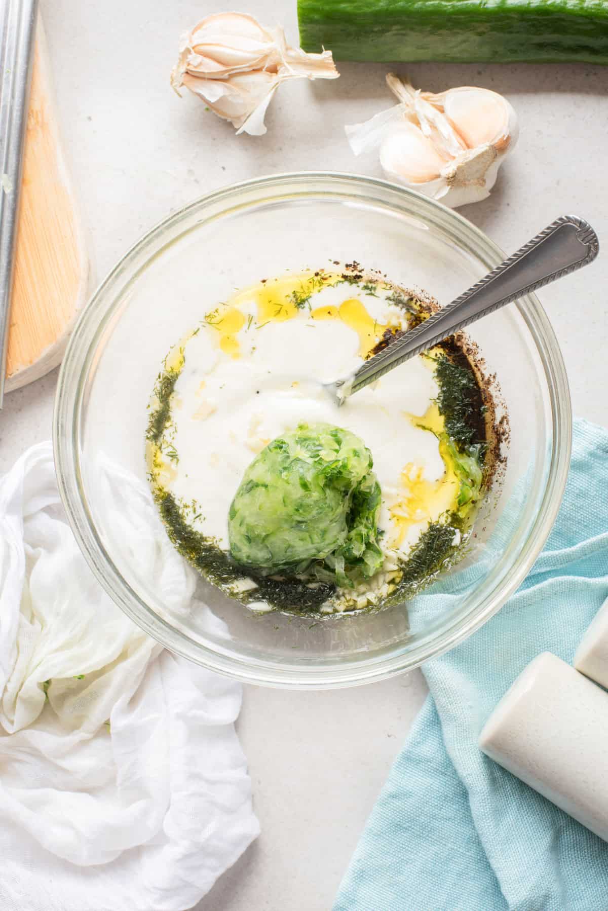 Cool and Creamy Tzatziki in a bowl with a spoon 