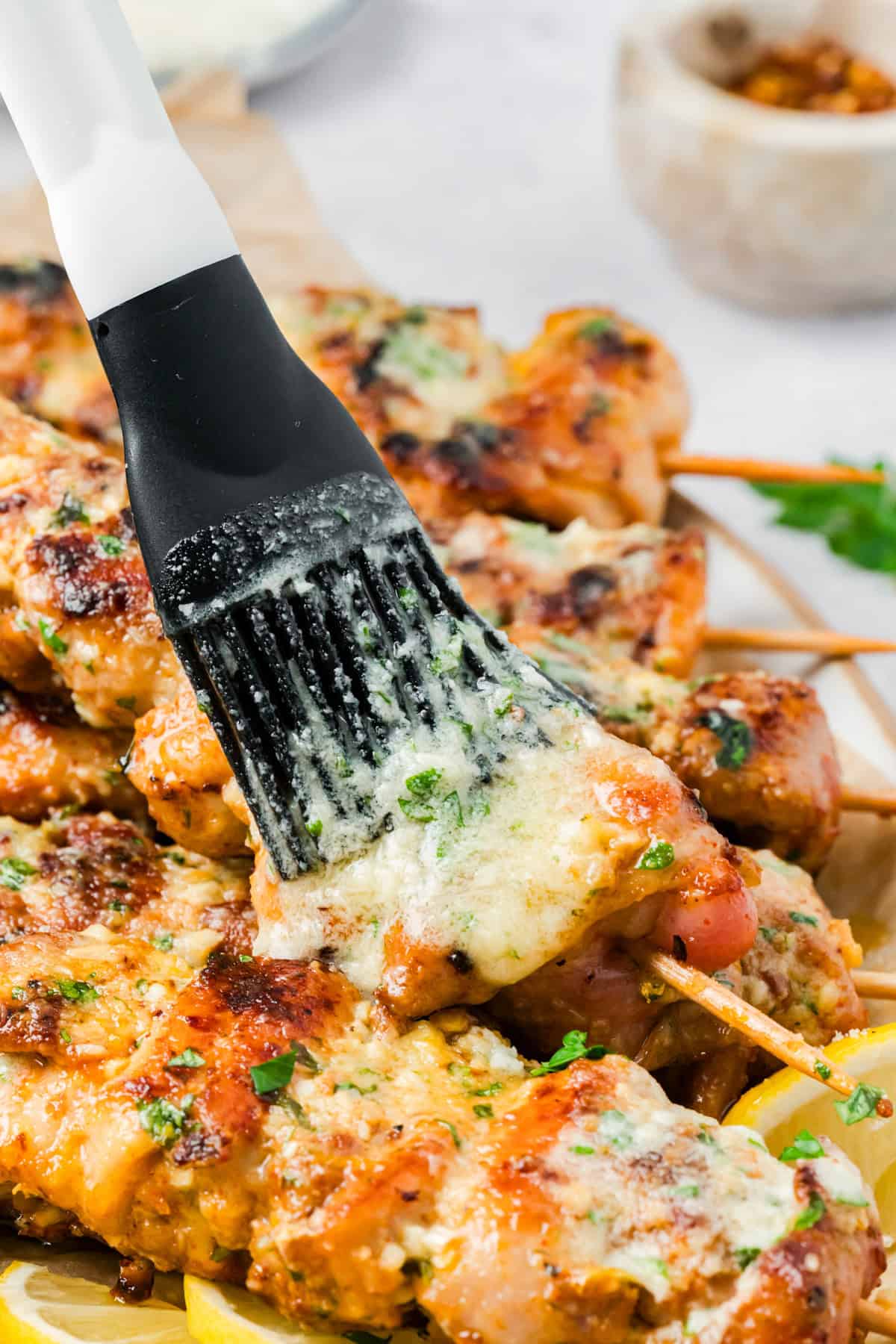 Garlic Parmesan Chicken Skewers brushed with garlic butter parmesan sauce 