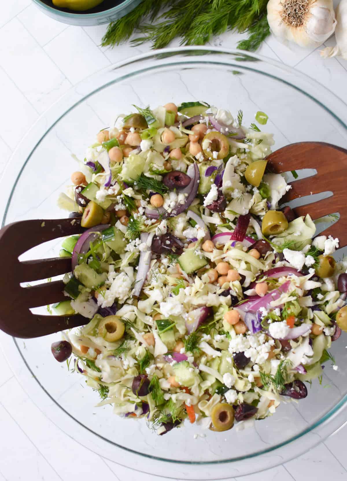 Greek Cabbage Salad mixed in a bowl 