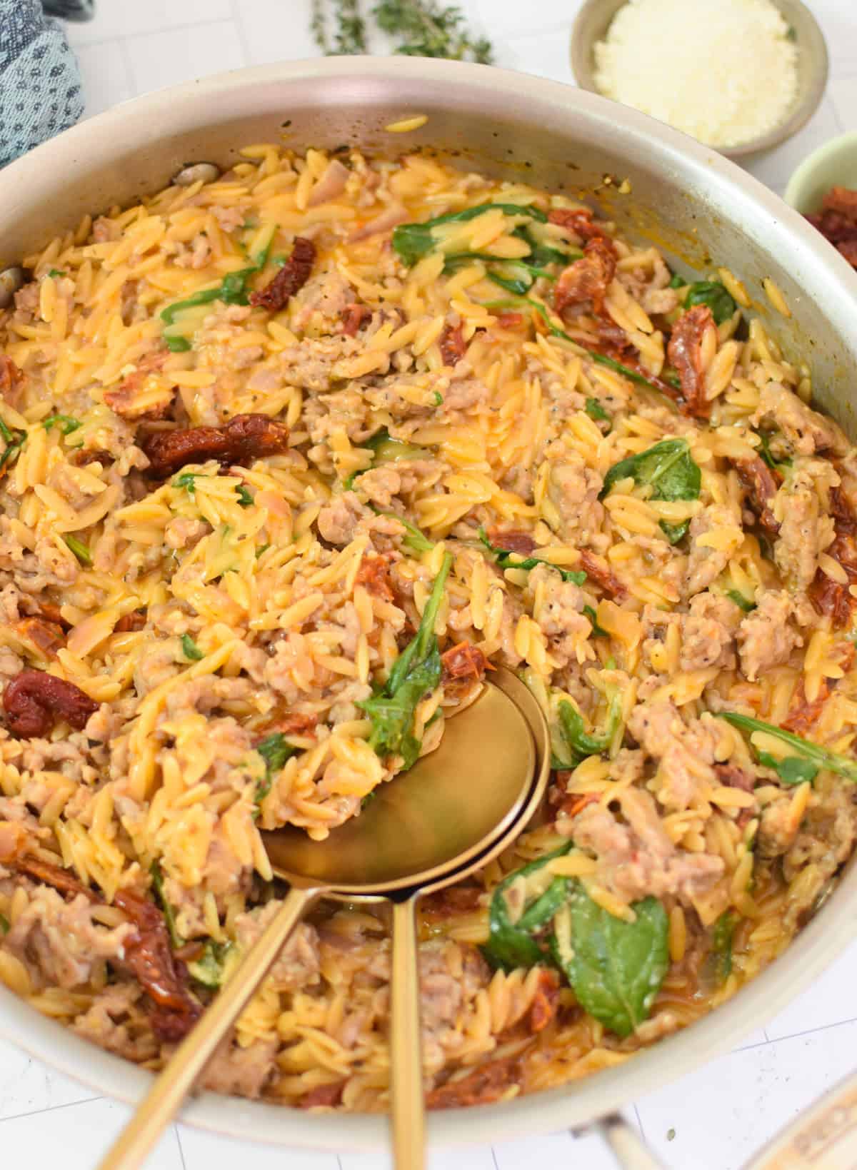 Cozy One Pot Sausage Orzo in a skillet