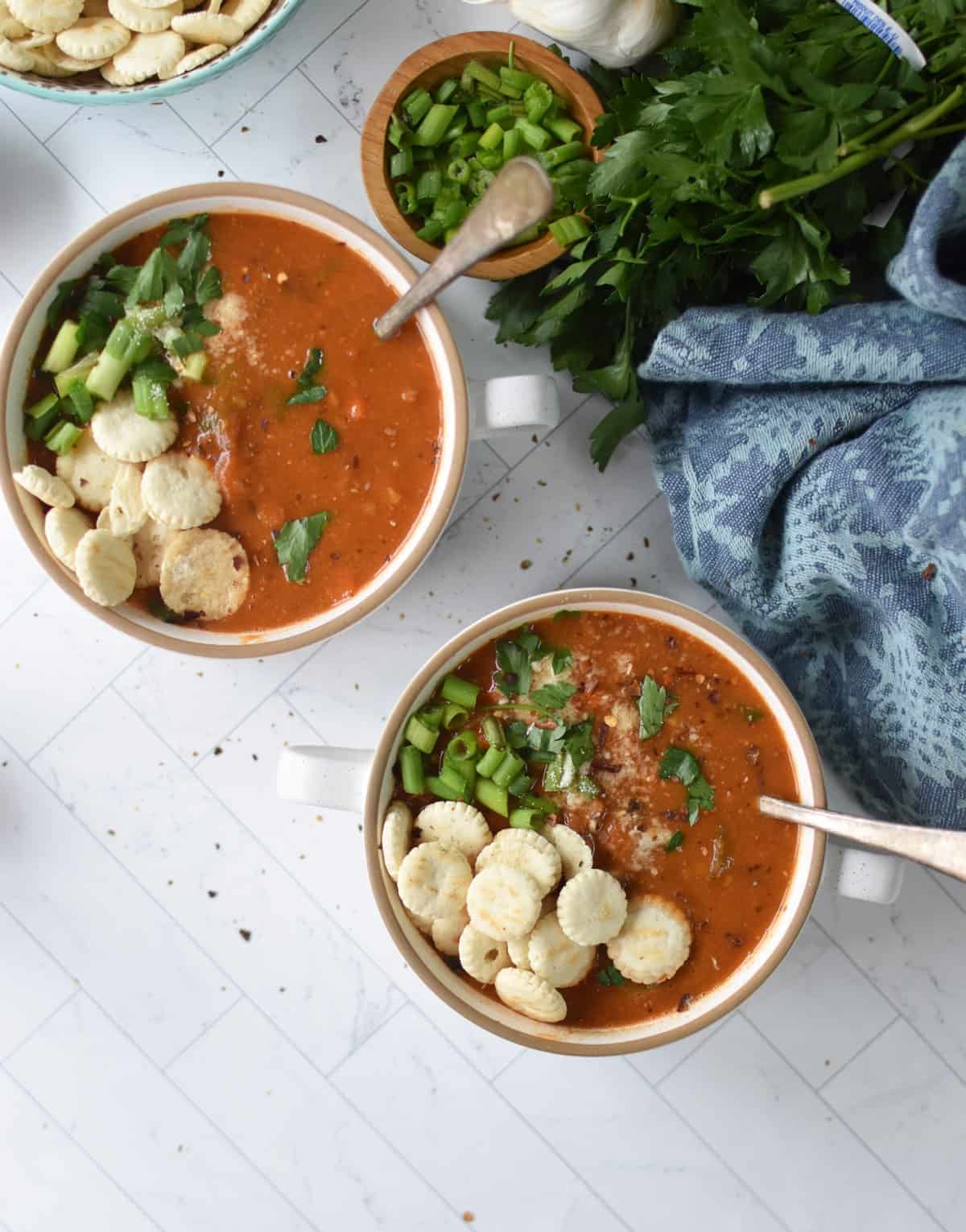Slow Cooker 15 Bean Soup in two bowls with spoons 