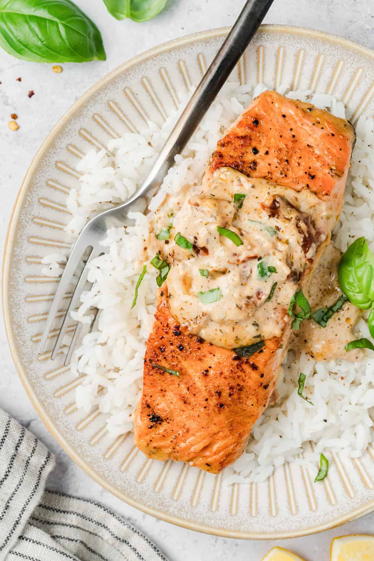Marry Me Salmon Recipe on a plate with a fork