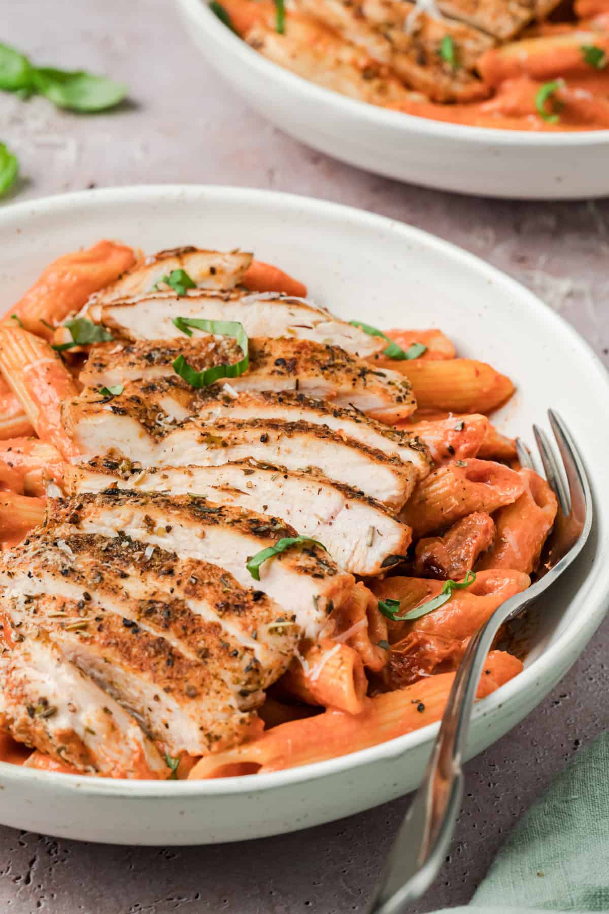 Creamy Tomato Chicken Pasta recipe with fork