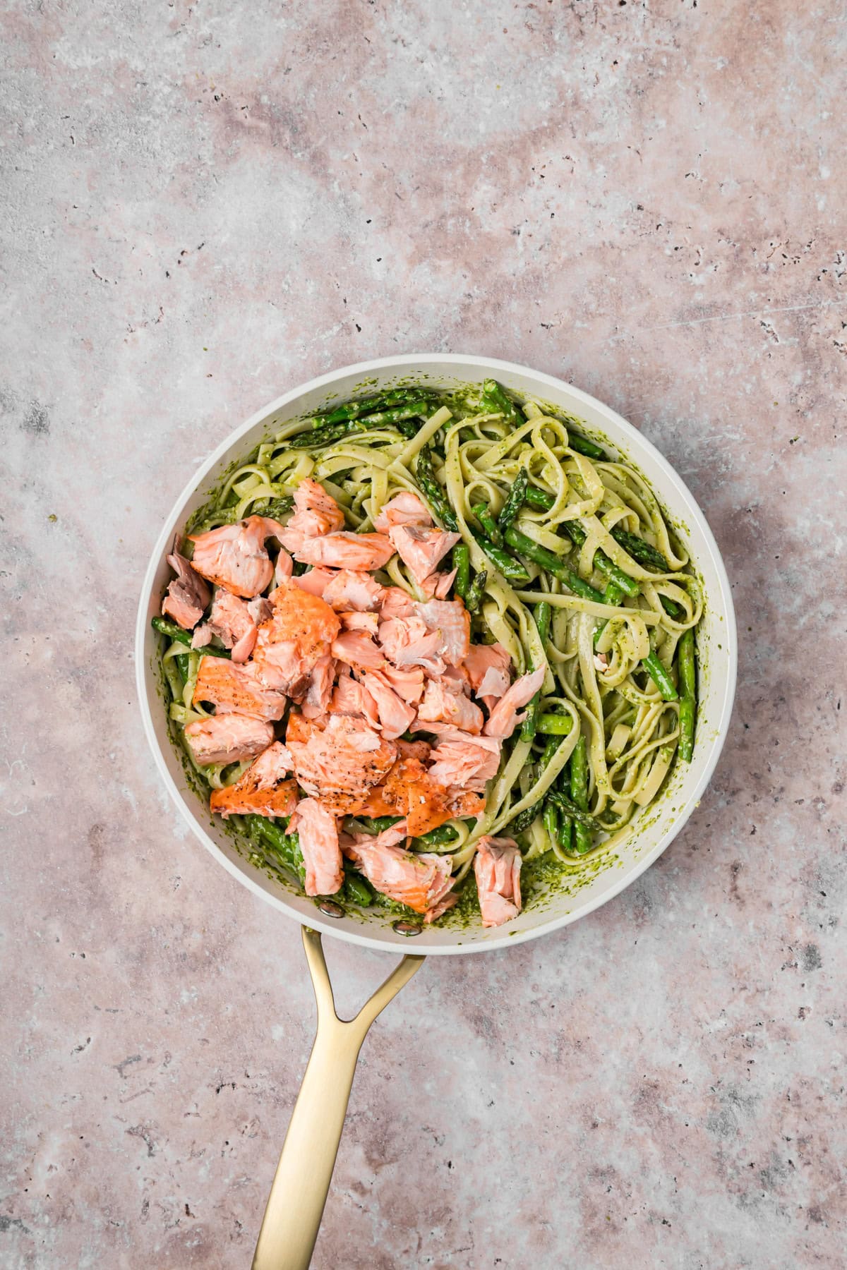 Pesto Salmon with Pasta in a skillet