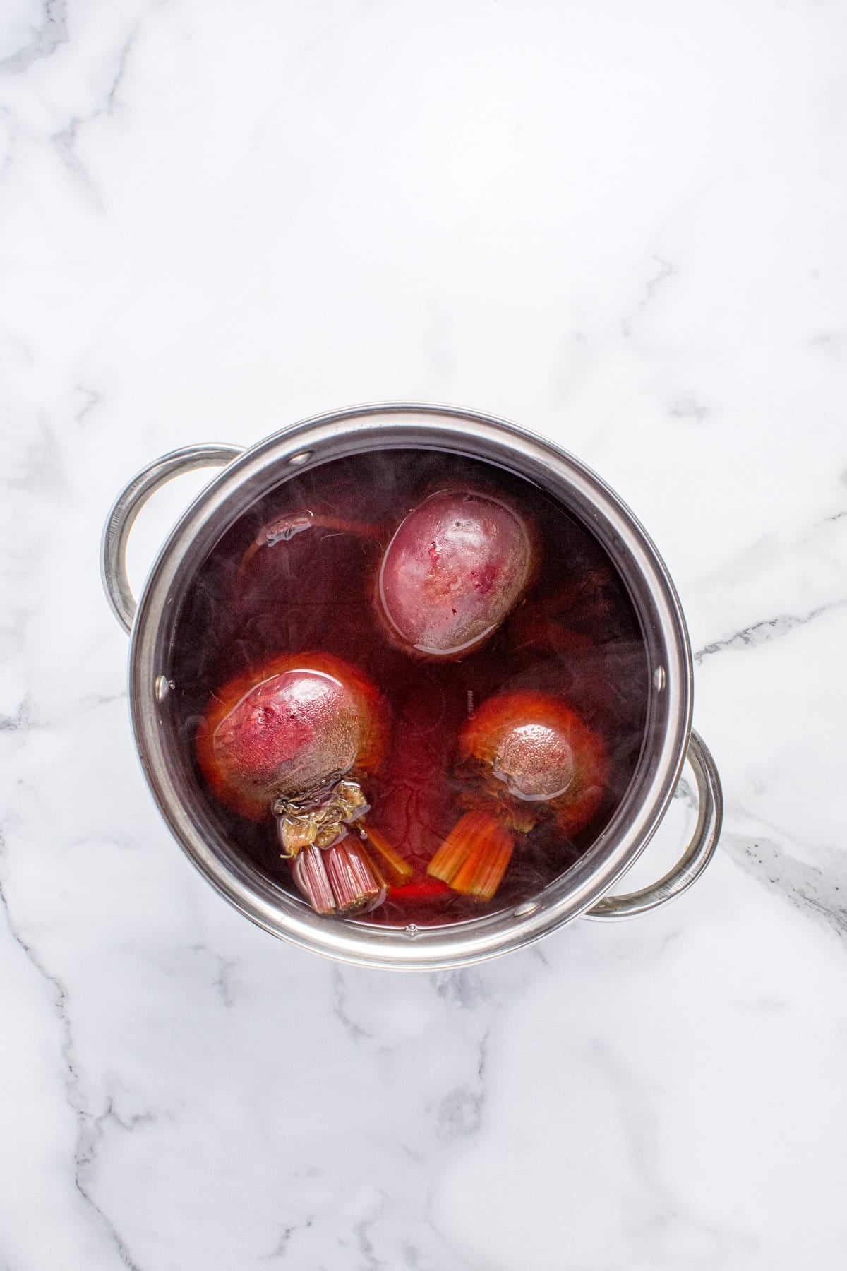Beets cooking in a pot