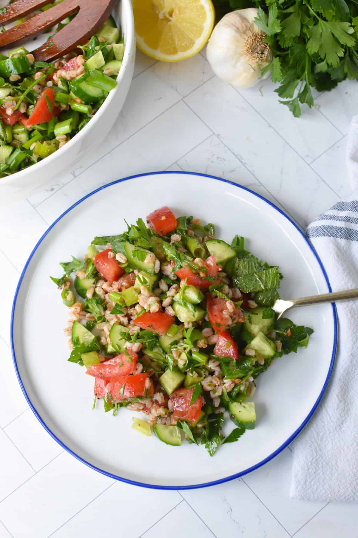 Farro Tabbouleh on a small white plate