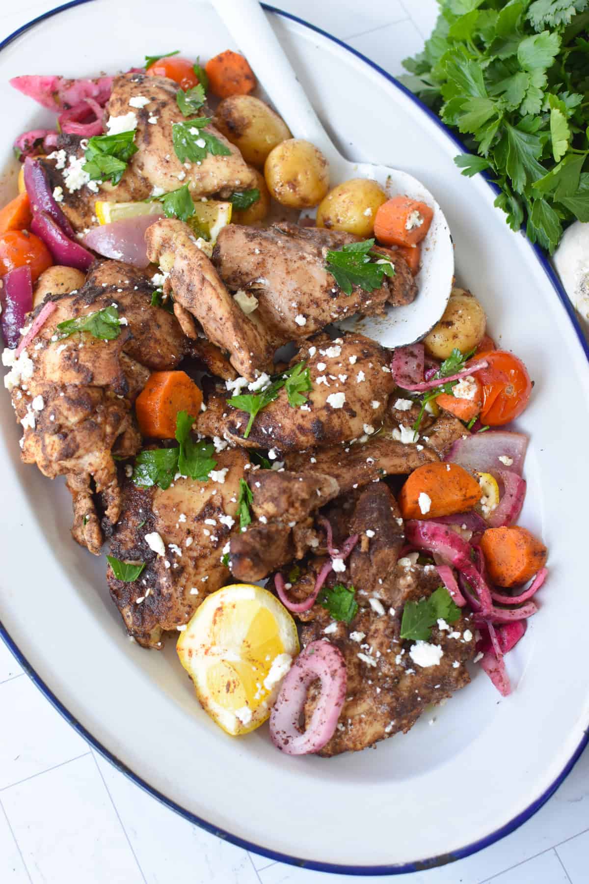 Golden baked Lebanese chicken thighs seasoned with baharat and lemon